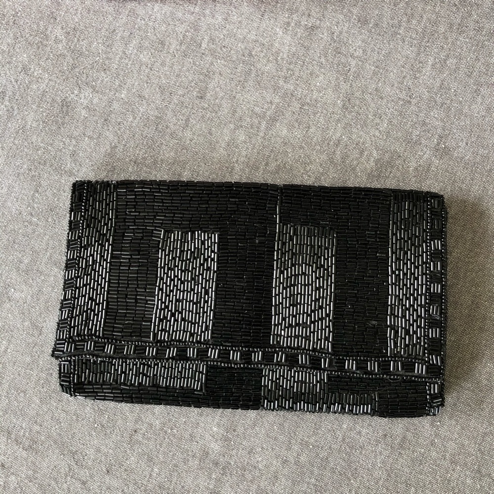 K.C. Malhan glitzy black clutch 8.5”x 5”